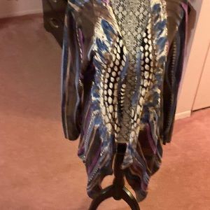 Long sleeve lightweight sweater in blues and purple with brown so any weather